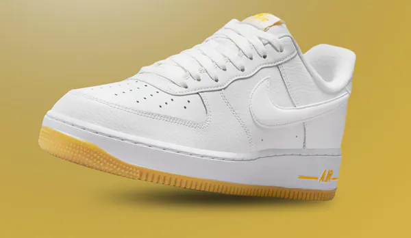 university gold nike air force 1