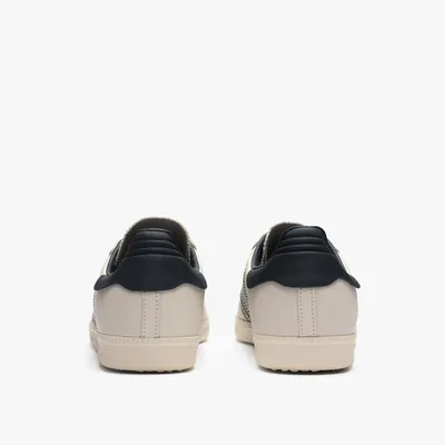 Adidas human race core black best sale